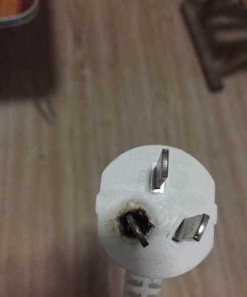 插頭燒黑了一點還能用嗎